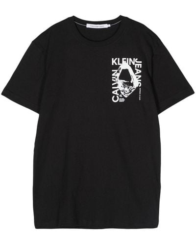 Calvin Klein T-shirt en coton à logo imprimé - Noir