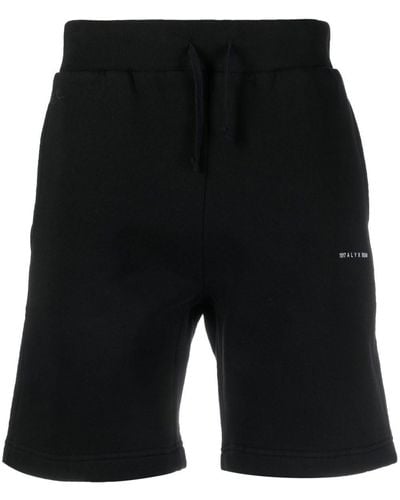 1017 ALYX 9SM Pantalones cortos de chándal con logo estampado - Negro