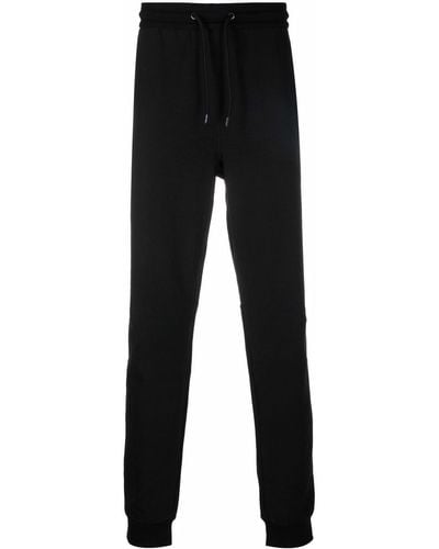 Calvin Klein Pantalones joggers con logo estampado - Negro
