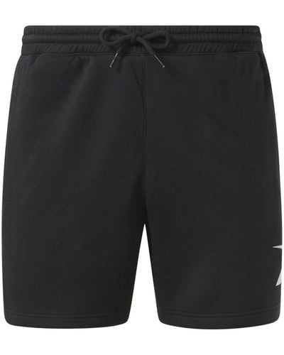 Reebok Pantalones cortos de deporte con logo estampado - Negro
