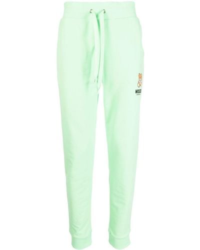 Moschino Pantalones de chándal con logo estampado - Verde