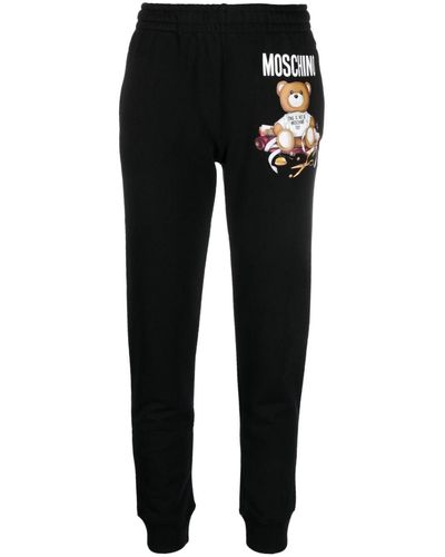 Moschino Pantalon de jogging en coton biologique à logo - Noir