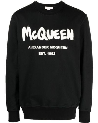 Alexander McQueen Sudadera con estampado de grafiti - Negro