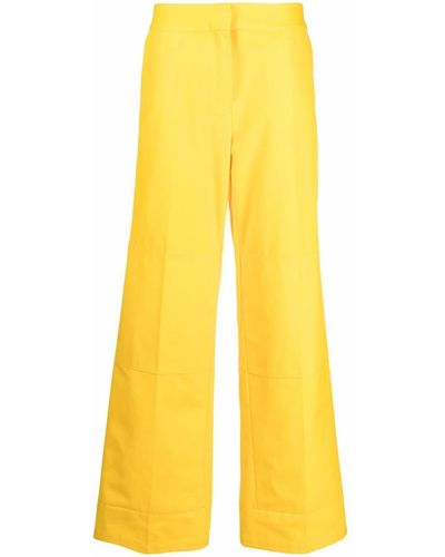 Raf Simons Pantalon droit à patch logo - Jaune