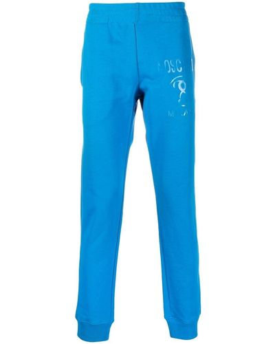 Moschino Pantalon de jogging à logo imprimé - Bleu