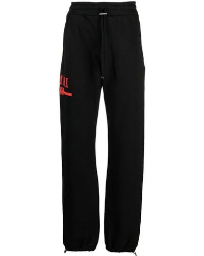 Amiri Jogginghose mit Logo-Print - Schwarz