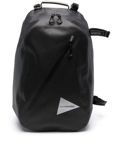 and wander Logo-print Backpack - Black