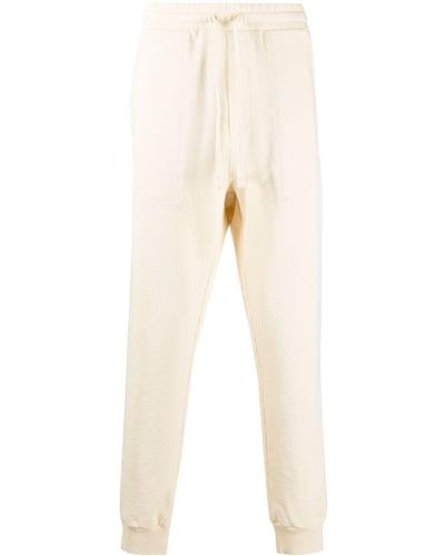 Nanushka Pantalones de chándal con logo bordado - Neutro