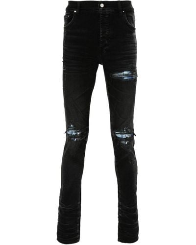 Amiri Jeans skinny con effetto vissuto MX1 - Nero