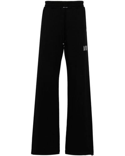 Amiri Pantalones de chándal anchos con logo Core - Negro