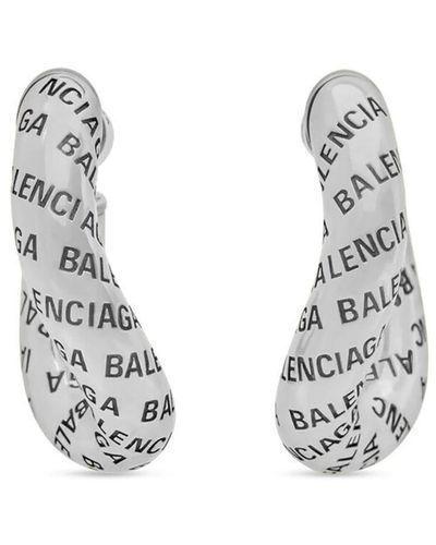 Balenciaga Boules d'oreilles à logo imprimé - Métallisé