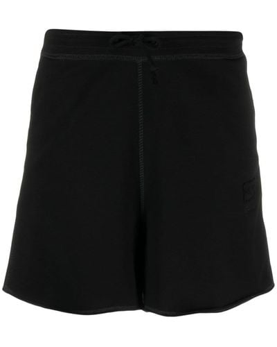 Ganni Pantalones cortos con parche del logo - Negro