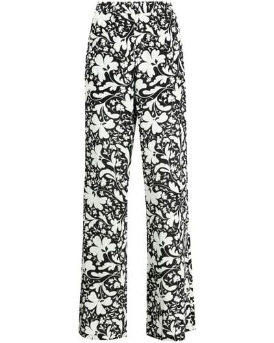 Stella McCartney Pantalon ample Lower à fleurs - Blanc