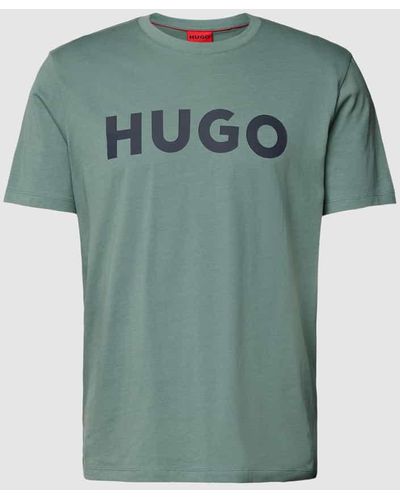 HUGO T-Shirt mit Motiv-Print und Logo-Print sowie Regular Fit - Grün