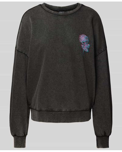 ONLY Oversized Sweatshirt mit Motiv-Print Modell 'LUCINDA' - Schwarz