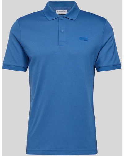 Calvin Klein Regular Fit Poloshirt mit Knopfleiste - Blau