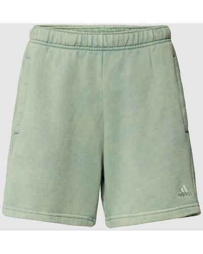 adidas Shorts mit Label-Stitching - Grün