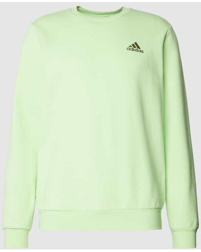 adidas Sweatshirt mit Label-Print und Rundhalsausschnitt - Grün