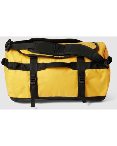 The North Face Duffle Bag mit Label-Details Modell 'BASE CAMP DUFFLE S' - Gelb