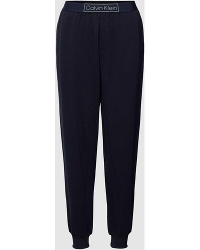 Calvin Klein Sweatpants mit elastischem Logo-Bund Modell 'Heritage' - Blau