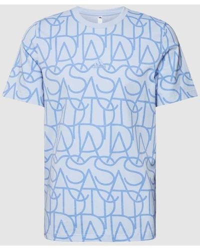 adidas T-Shirt aus Baumwolle mit Allover-Print - Blau