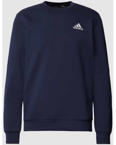 adidas Sweatshirt mit Rundhalsausschnitt Modell 'FEELCOZY' - Blau