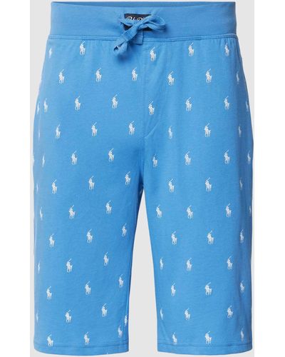 Polo Ralph Lauren Slim Fit Sweatshorts mit Allover-Logo-Muster Modell 'LIQUID COTTON' - Blau