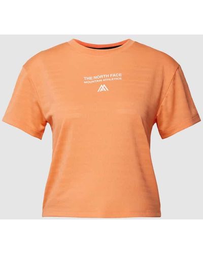 The North Face Cropped T-Shirt mit Label-Print - Orange