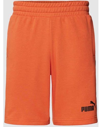 PUMA Shorts mit Label-Details - Orange