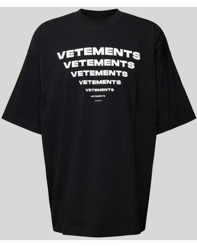 Vetements Oversized T-Shirt mit Label-Print - Schwarz