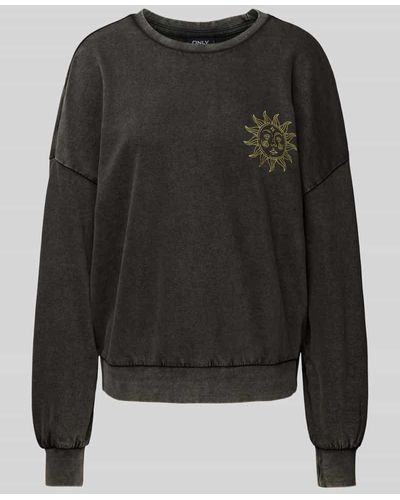 ONLY Oversized Sweatshirt mit Motiv-Print Modell 'LUCINDA' - Schwarz
