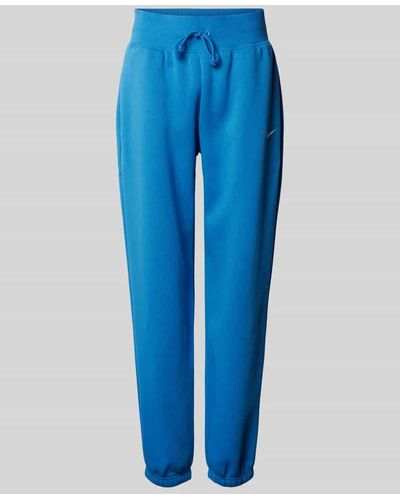 Nike Loose Fit Sweatpants mit Logo-Stitching - Blau