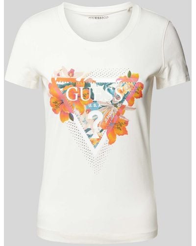 Guess T-Shirt mit Label- und Motiv-Print Modell 'TROPICAL TRIANGLE' - Weiß