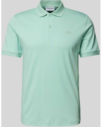Calvin Klein Regular Fit Poloshirt mit Knopfleiste - Grün