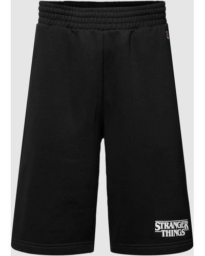 Champion Sweatpants mit Logo-Stitching - x Stranger Things - Schwarz