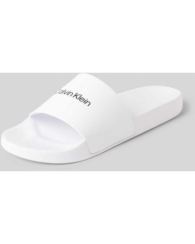 Calvin Klein Slides mit Label-Schriftzug Modell 'POOL SLIDE' - Weiß