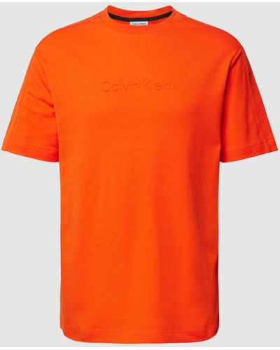 Calvin Klein T-shirt Van Katoen Met Labeldetail - Oranje