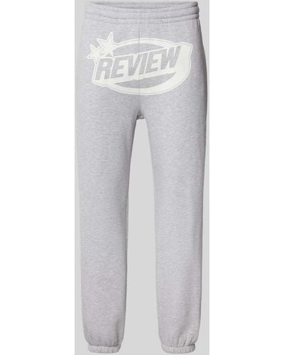 Review Regular Fit Sweatpants mit Label-Print - Weiß