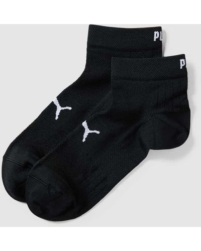 PUMA Socken mit eingewebten Label-Details im 2er-Pack Modell 'Quarter' - Schwarz