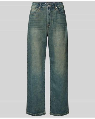 Review Jeans mit weitem Bein im Used-Look - Grün