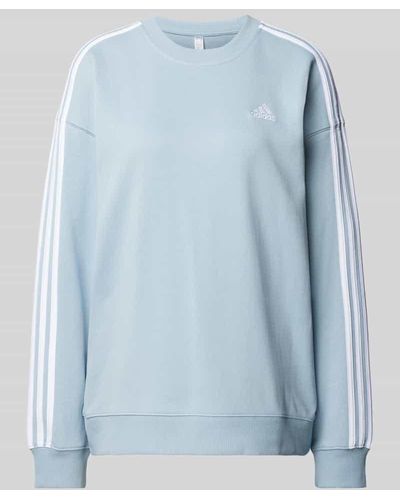 adidas Oversized Sweatshirt mit Label-Stitching - Blau