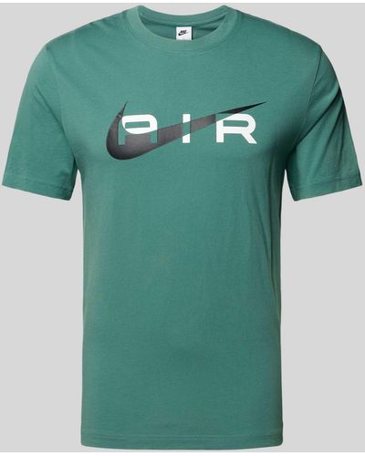 Nike T-Shirt mit Label-Print - Grün