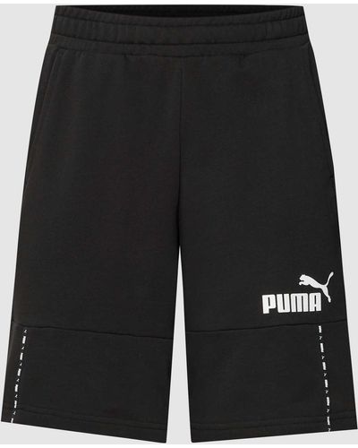 PUMA Shorts mit Label-Details - Schwarz