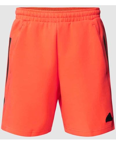 adidas Shorts mit Label-Detail - Orange