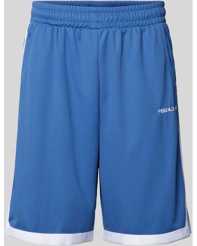PEGADOR Loose Fit Basketballshorts mit Label-Stitching - Blau
