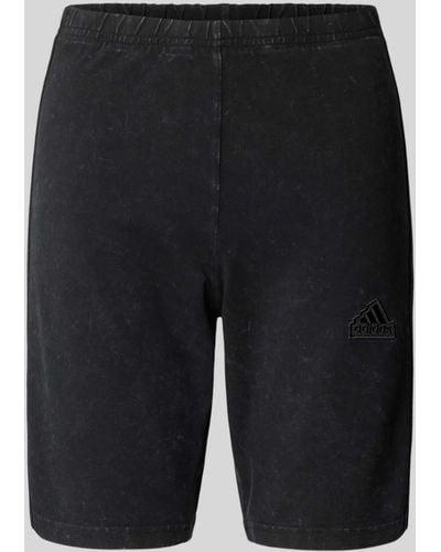 adidas Shorts mit elastischem Bund - Schwarz