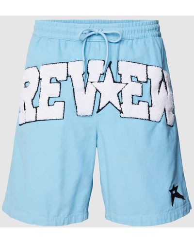 Review Baggy Shorts im College Star Style - Blau