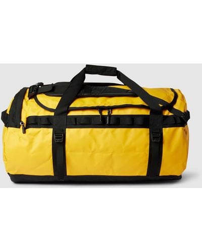 The North Face Duffle Bag mit Label-Print Modell 'BASE CAMP DUFFLE L' - Gelb