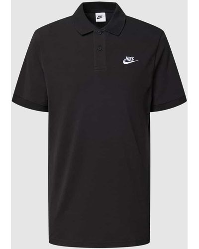 Nike Poloshirt mit Knopfleiste und Logo-Detail - Schwarz