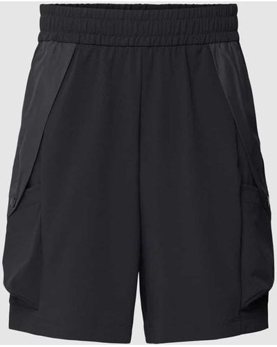 adidas Shorts mit seitlichen Eingrifftaschen - Schwarz